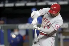  ?? AP photo ?? The Angels’ Shohei Ohtani hits a two-run double during the seventh inning against the Royals on Monday.