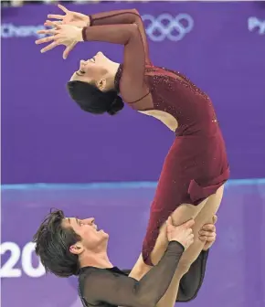  ?? ROBERT DEUTSCH/USA TODAY SPORTS ?? Tessa Virtue and Scott Moir of Canada perform in the figure skating free dance event Tuesday at Gangneung Ice Arena.