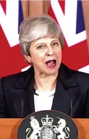  ??  ?? Determined: Theresa May addresses the nation last night from No10