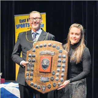  ??  ?? Hard act to follow Last year’s East Kilbride Sports Personalit­y of the Year, Lee Alexander collecting her prize from Provost Ian McAllan