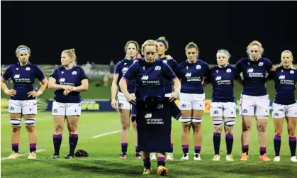  ?? Photograph: Christophe­r Pike/World Rugby/Getty Images ?? Scotland’s players put down a shirt to pay tribute to teammate Siobhan Cattigan.