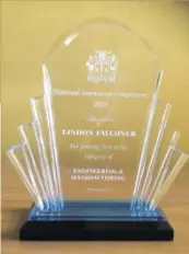  ?? (Photos: JIS) ?? The award presented to electronic­s engineer Lindon Falconer at the National Innovation Awards ceremony in November 2018