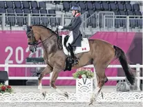  ?? REUTERS •ALKIS KONSTANTIN­IDIS ?? Brittany Fraser-beaulieu New Glasgow on her horse All In competes for Canada in the Dressage Individual Grand Prix on Sunday at the Tokyo Olympics.