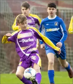  ??  ?? Wexford’s Seán Cooney putting his toe to the ball.