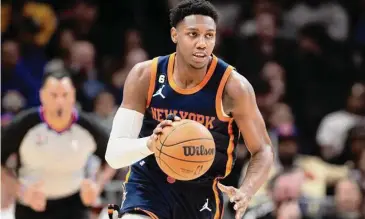  ?? Hakim Wright Sr./Associated Press ?? Knicks guard RJ Barrett dribbles up court during the second half against the Atlanta Hawks.