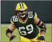  ?? JEFFREY PHELPS — THE ASSOCIATED PRESS ?? Green Bay Packers offensive tackle David Bakhtiari will miss the rest of the season after the three-time Pro Bowl selection injured his knee in practice Thursday.