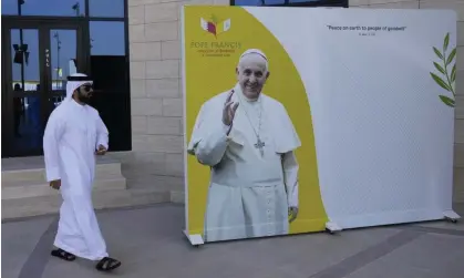  ?? ?? A Pope Francis poster at a cathedral in Manama, Bahrain, flags up the pontiff’s visit to the state from 3 November. Photograph: Hussein Malla/AP