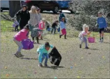  ?? PETE BANNAN — DIGITAL FIRST MEDIA ?? Hundreds of children turned out for the 14th annual First Presbyteri­an Church Easter Egg Hunt at Everhart Park Saturday.