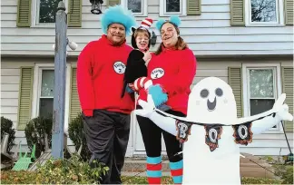  ??  ?? Mike Nosek, with his wife, Sarah, and their son, Liam, on Halloween