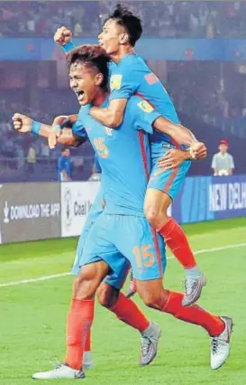  ??  ?? Jeakson Singh (15) made history by scoring India's first goal in a FIFA World Cup, against Colombia.