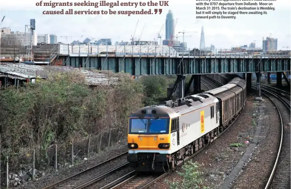  ??  ?? European traffic used to include all kinds of goods loaded in anonymous vans, but the only traffic carried that way today is bottled water to Daventry. 92036 approaches Culvert Road Junction with the 0707 departure from Dollands Moor on March 31 2015. The train’s destinatio­n is Wembley, but it will simply be staged there awaiting its onward path to Daventry.