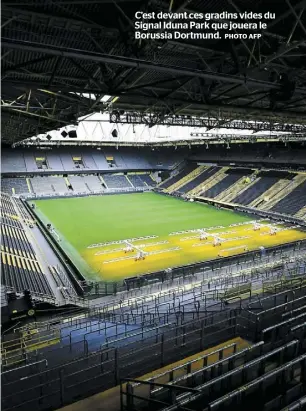  ?? PHOTO AFP ?? C’est devant ces gradins vides du Signal Iduna Park que jouera le Borussia Dortmund.