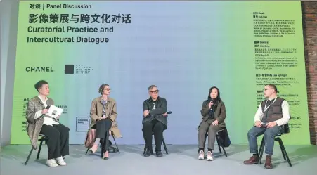 ?? ?? A panel discussion on Curatorial Practice and Intercultu­ral Dialogue is held during the opening week of the ninth Jimei x Arles Internatio­nal Photo Festival in Xiamen, East China’s Fujian province, on Dec 16, 2023.