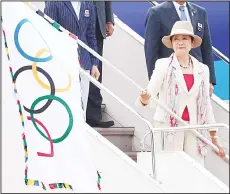  ??  ?? Tokyo Gov Yuriko Koike waves the Olympic flag upon arrival of the flag at Haneda Internatio­nal Airport in Tokyo on Aug 24. The countdown to the 2020 Olympics began Wednesday with the arrival of the Olympic flag in
Tokyo from Rio de Janeiro.