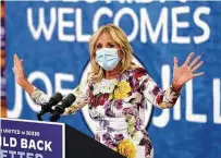  ?? Andrew Harnik / Associated Press ?? Jill Biden speaks Monday on the campaign trail in Miami. She will appear in cities across Texas as early voting begins.