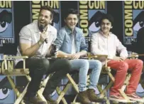  ?? PHOTO BY CHRIS PIZZELLO/THE ASSOCIATED PRESS ?? Zachary Levi, Asher Angel and Jack Dylan Grazer, from left, speak at a Comic-Con panel for the upcoming superhero movie “Shazam!”