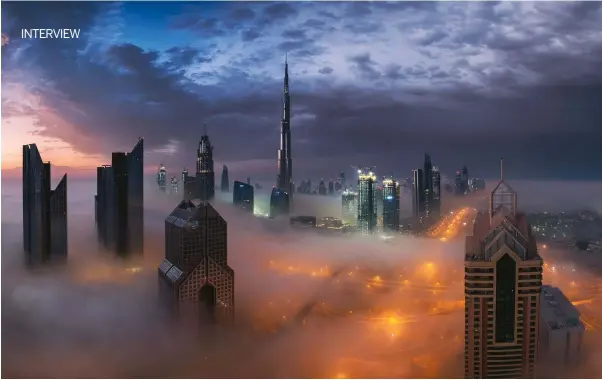  ??  ?? Above
TEMPEST A breathtaki­ng sunrise in dubai as thick fog pours through the futuristic and beautiful city skyline