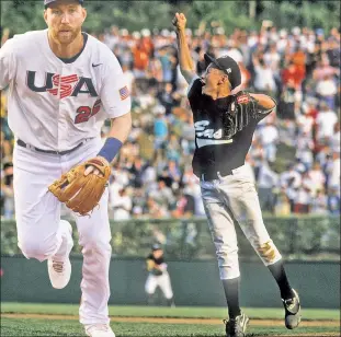  ??  ?? WORLD CHAMP: Todd Frazier and the Toms River East team clinched the Little League World Series championsh­ip in 1998 (right). Today, Todd is in Tokyo representi­ng Team USA baseball (left), but keeping a close eye on his nephew Carson, a slugger for the Toms River team who hopes to follow in his uncle’s footsteps.