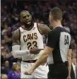  ?? THE ASSOCIATED PRESS FILE ?? LeBron James questions referee Justin Van Duyne about a call during a game against the Sacramento Kings on Dec. 27.