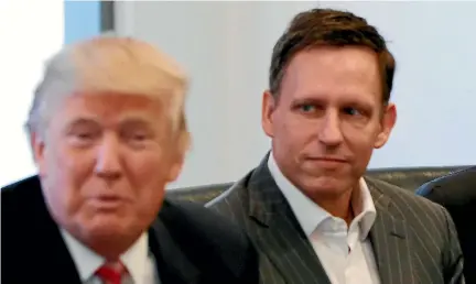  ?? PHOTO: REUTERS ?? United States tech billionair­e Peter Thiel, pictured with President Donald Trump, has been a New Zealand citizen since 2011.