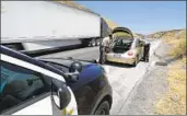  ?? Myung J. Chun Los Angeles Times ?? SHERIFF’S deputies look through a car after the driver consented to a search on the 5 Freeway.