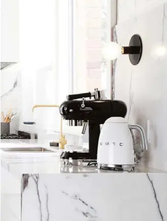  ??  ?? MAIN IMAGE Smeg has a retro-styled espresso machine in five great colours, including this black version. CLOCKWISE FROM ABOVE Fisher & Paykel EB60DSXB2 built-in coffee maker, $4299, Bing Lee. De’Longhi PrimaDonna EABI 6600 built-in coffee machine, $1949, Winning Appliances. Gaggenau ‘200 Series CMP 250 101’ fully automatic built-in espresso machine, $5999, Winning Appliances. Bosch ‘Series 8 CTL636ES1’ fully automatic built-in coffee machine, $3699, The Good Guys.