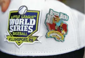  ?? Steve Gonzales / Houston Chronicle ?? This special-edition pin — featuring a Texas longhorn dressed as an umpire — was personaliz­ed for Bruce Hicks to trade with others participat­ing in the upcoming Little League World Series in Williamspo­rt, Pa.