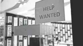  ?? LYNNE SLADKY/AP FILE ?? The surging coronaviru­s pandemic appears to be weakening the job market and the economy and threatenin­g to derail any recovery.