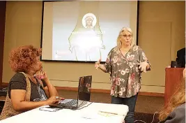  ?? Staff photo by Jennifer Middleton ?? ■ Bess Gamble Williams looks on as Tammie Davis speaks Tuesday during Friends United for a Safe Environmen­t’s 30th birthday celebratio­n. Both have worked to bring awareness to environmen­tal issues in Texarkana.