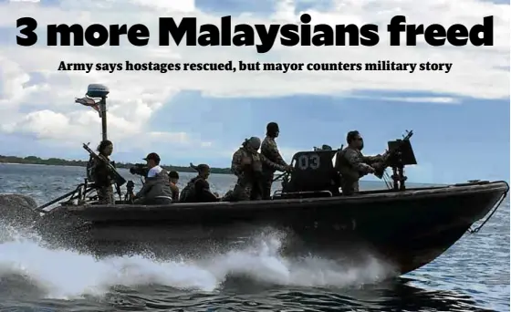  ?? —JULIE S. ALIPALA ?? Members of the Naval Forces Special Operations Group patrol the seas off Basilan province during the hunt for kidnappers of Malaysian tugboat crewmen kidnapped in waters near Tawi-Tawi and Sabah.