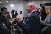  ?? J. SCOTT APPLEWHITE — THE ASSOCIATED PRESS FILE ?? Sen. Mark Kelly, D-Ariz., speaks with reporters following a classified briefing on China, at the Capitol in Washington on Feb. 15.