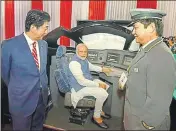  ?? PTI ?? PM Narendra Modi with Shinzo Abe during their visit to an exhibition at Mahatma Mandir in Gandhinaga­r on Thursday.