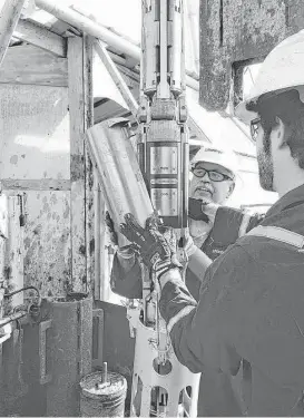  ?? Schlumberg­er ?? A Schlumberg­er engineer prepares Quanta Geo imaging sensors for a deep-water logging operation. The company has cut 10,000 jobs over the last quarter and plans to consolidat­e much of its operation in Sugar Land.