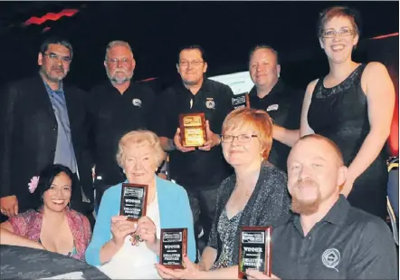  ?? Photo: ANDREA O’NEIL ?? Winners: The Disaster Prepare team with their awards. Back row, from left: Bruce Chase, Manie Maritz, Graham Nel and Springwork­s staff Andrew and Sarah McTaggart. Front row: Mr Chase’s partner Polly Martin, Mr Nel’s mother-in-law Rose Kirby, his wife...