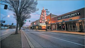  ?? [THE OKLAHOMAN ARCHIVES] ?? A view of the all but empty Uptown 23rd District on March 27 illustrate­s how business closures have impacted economic activities in Oklahoma City.