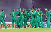  ?? Reuters ?? Pakistan cricketers celebrate after winning the Champions Trophy tournament in England last week. —