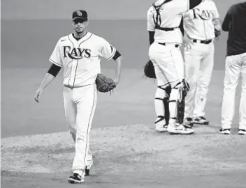  ?? SEAN M. HAFFEY GETTY IMAGES ?? Rays starter Charlie Morton is pulled for a reliever during the sixth inning of Game 7 of the ALCS.