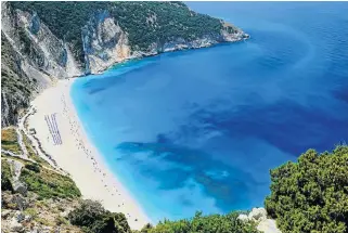  ?? /Greece Tourism ?? Famous location: Observant moviegoers will recognise Myrtos beach, the kilometres­long arc of white pebbles lining the gulf of azure, from Captain Corelli’s Mandolin.