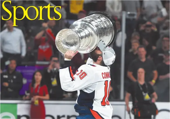  ?? HANDOUT PHOTO ?? Washington Capital’s player Brett Connolly kisses the Stanely Cup after the Capitals defeated the Las Vegas Golden Knights 4-3 on June 7 to win the Stanley Cup final series 4-1 in Las Vegas, Nevada.