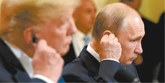  ??  ?? US president Donald Trump and Russia’s President Vladimir Putin at a joint press conference after their meeting in Helsinki on Monday.