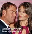  ?? ?? Elizabeth Hurley with Shane Warne in 2012