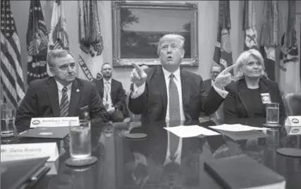  ?? AL DRAGO, NEW YORK TIMES ?? U.S. President Donald Trump meets with a group of sheriffs in the Roosevelt Room of the White House in Washington on Tuesday.