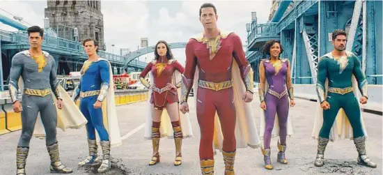  ?? Warner Bros. ?? Ross Butler, from left, Adam Brody, Grace Caroline Currey, Zachary Levi, Meagan Good and D.J. Cotrona star as superheroe­s in “Shazam! Fury of the Gods.”