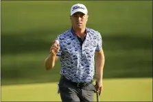  ?? ERIC GAY — THE ASSOCIATED PRESS ?? Justin Thomas waves after making a putt on the 10th hole during the second round of the PGA Championsh­ip golf tournament at Southern Hills Country Club, Friday, May 20, 2022, in Tulsa, Okla.