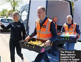  ?? IAN VOGLER/DAILY MIRROR/PA WIRE ?? The Prince of Wales delivers supplies from Surplus to Supper during a visit to the Hanworth Centre Hub youth centre in Feltham