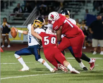  ?? Christian Monterrosa /The Signal ?? SCCS linebacker Dylan Rowsey (58) sacks Santa Clara’s Robert Rush, Jr. (5) in a playoff game in Valencia. on Friday.