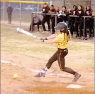  ?? MARK HUMPREY ENTERPRISE-LEADER ?? Prairie Grove senior Anna Kidd fouls off a pitch during the Lady Tigers’ 8-6 win over 7A Fort Smith Northside on March 7. Kidd went 3 for 4 with three triples and 4 RBIs.