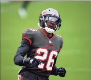  ?? Justin Edmonds / Associated Press ?? Tampa Bay Buccaneers safety Andrew Adams jogs on the field against the Denver Broncos in the first half in September.