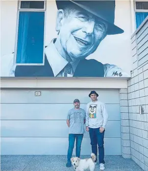  ??  ?? Graham Hoete, right, and his Leonard Cohen portrait on the Tauranga home of Tom Zonneveld.