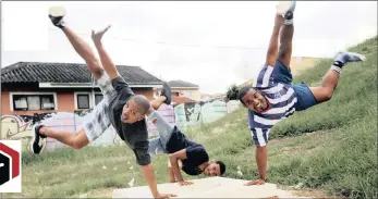  ??  ?? DANCE THERAPY: From left, Shannon Bailey, Lourenzo Pillay and Jose Africa, of Sydenham’s Sho Dem hiphop troupe, perform in their local park where they hope to tempt people away from gangsteris­m and drugs.